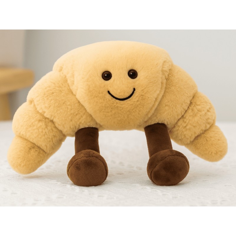 Croissant de peluche sonriente dulce...